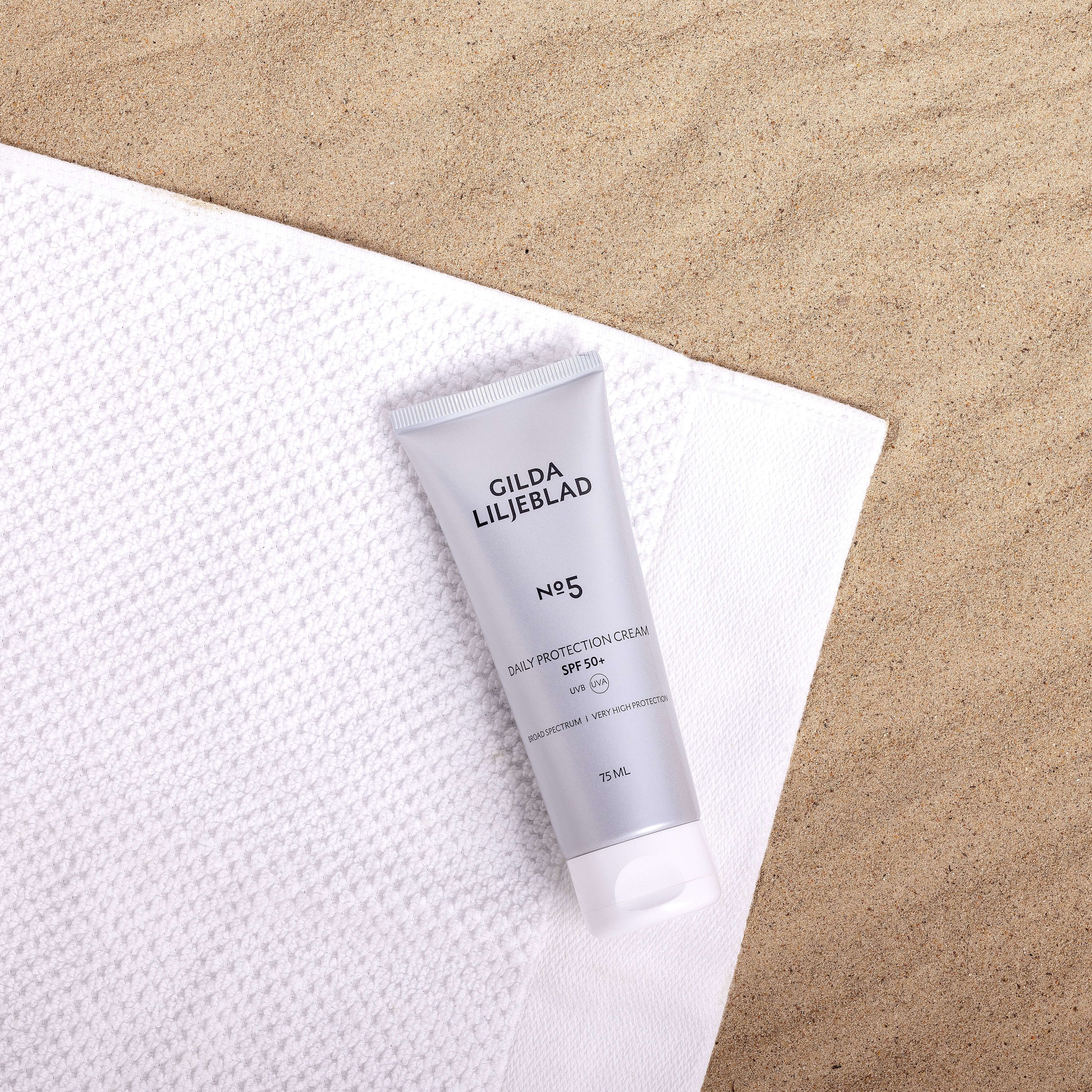 Denní ochranný krém SPF 50+ na pláži